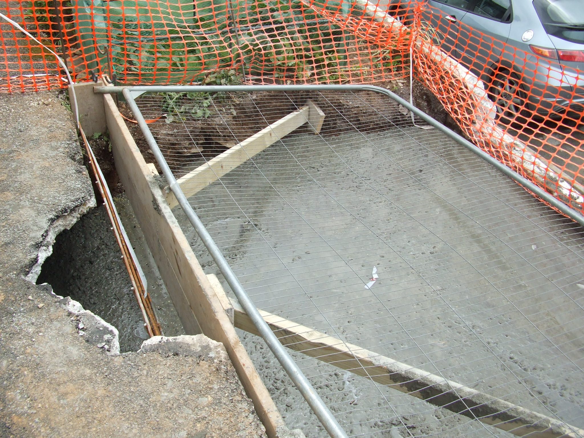 Hole filled with concrete.