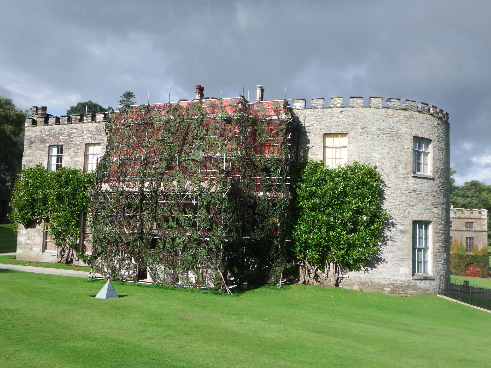 Camouflaged scaffolding during works.